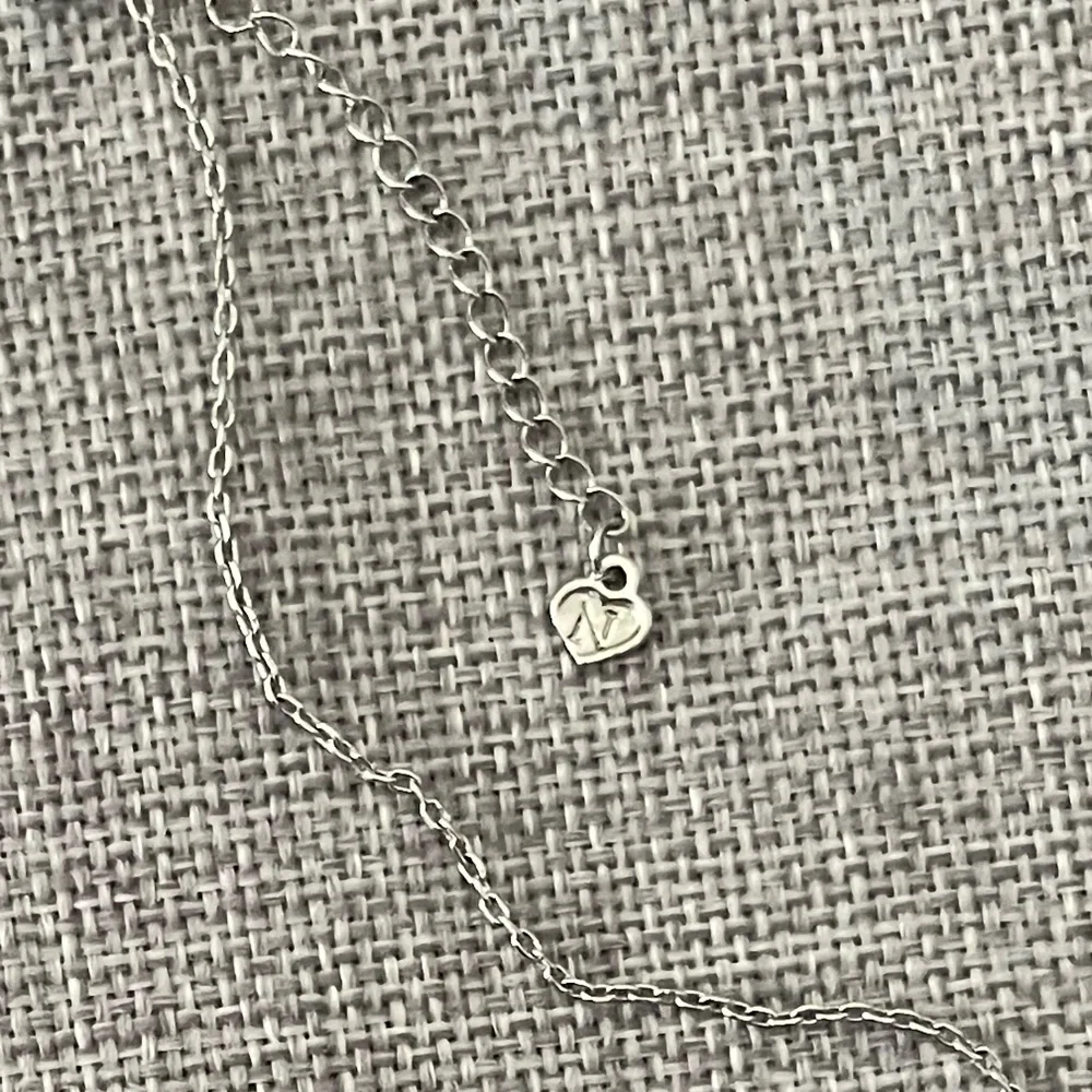 Silver Tone Teardrop Necklace with Blue Crystal & Pavé Accents